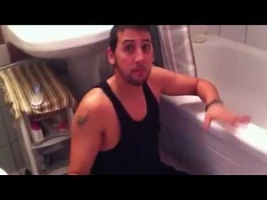 Bilateral amputee above the knee without legs in a washroom