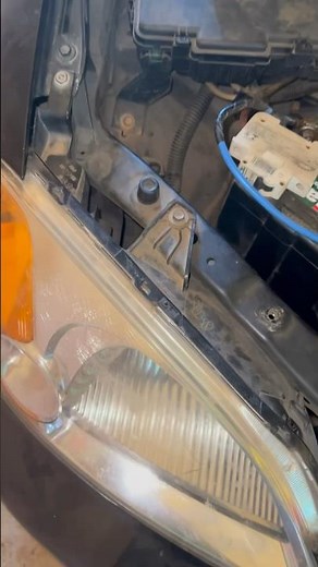 How do I adjust the headlights on a Honda Civic?
