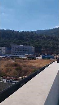View from above mountains, valley, and sky in Israel