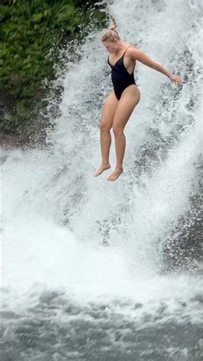 Angels Jumping into the Waterfall–A Captivating Spontaneous Moment#waterfall #nature #cliffjumping