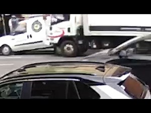 Video shows box truck slam into parked van in Midtown, injuring 10 people