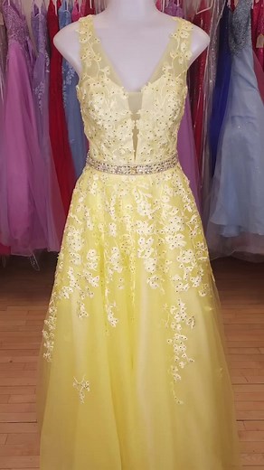🌟 Check out this stunning pale yellow prom dress! 😍 It features a low v neckline, beautiful floral lace, and a gorgeous low back with transparent strapping. ✨ It's so elegant, it's like a dress Snow White herself would wear! 🍎✨ Don't miss out on this enchanting look for your special night! 💃✨ #PromGoals #SnowWhiteInspired . . Get in during the Prom Blowout and find dresses as low as $49. Shop early and get great deals! . . . . #prom2024 #edithsbridal #ediths #downtownfdl #fonddulac #psfashio