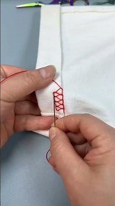 Hand overlocking in action, creating neat and durable fabric edges #sewing #handmade #DIYfashion
