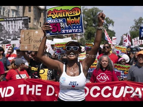 Thousands protest for a 'Free DC' against federal control in Washington
