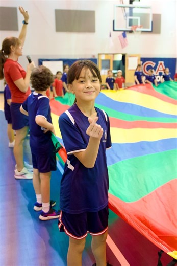 Our 3rd and 4th graders had a blast during team-building with our P.E. parachute 🎉 Learning how to work together, encourage one another, and celebrate as a team. | International Christian Academy