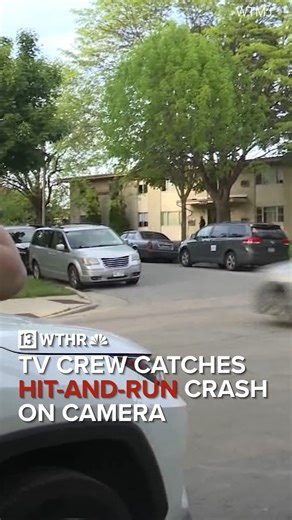 The Milwaukee news crew was in the middle of an interview when the stolen car crashed into a parked car, and it was all caught on camera. | WTHR-TV