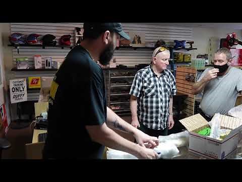 MJ Pawn Shop Haggling, Vintage T-shirts, and DAV Keychain License Plate Tags