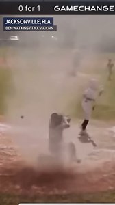 WATCH: A 7-year-old catcher got caught in a short-lived dust devil during a baseball game in Jacksonville, Florida, over the weekend. Video captured the moment at home plate before an umpire pulled him away. | WISN 12 NEWS