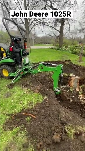 John Deere 1025R Backhoe Digging Out Tree Stumps #ricks2cents
