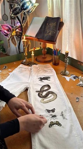 fixing stained jeans with printable, iron on decals #upcycledclothes #diyclothing #repurposedjeans