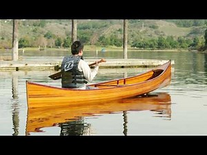 Stunning 18 ft Handcrafted Wooden Canoe – Adventure Awaits!