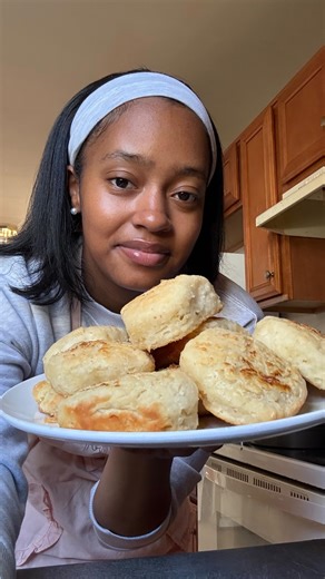 Buttermilk Biscuits at Home 🫶🏽 * 2 cups self rising flour, some for dusting * 1 stick of salted butter, shredded or chopped in small pieces * 2/3 - 1 cup buttermilk, some for brushing on biscuits before baking * 6 tbsp salted butter, melted If using unsalted butter, add some salt to your dry ingredients. (1/4-1/2 tsp of salt) Oven Temperature: 425F Bake Time: 17-18 minutes Broil for 1-2 minutes for crispy top, optional Yields: 12 biscuits 1. Preheat oven to 425F. 2. Chop or shred your butter i