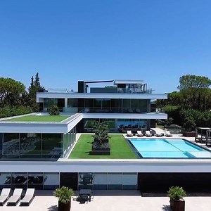 Mega Mansions on Instagram: "@SuperPrimeSurrey offering this stunning €20,000,000 modern home ‘Villa Amandum’ located in Quinta do Lago, Portugal. Arguably the finest villa available in The Algarve today, it has luxury living space including 8 bedrooms with en-suites along with 3 swimming pools, jacuzzi, gym, sauna, wine room and more. For more information contact @SuperPrimeSurrey about this beautiful property situated within the renowned The Algarve, Portugal. #Savills"