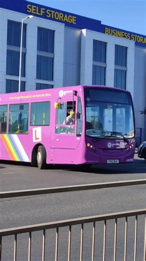 YX12 DLK 8781 Transport UK Bus Driver Training entering Great West Road