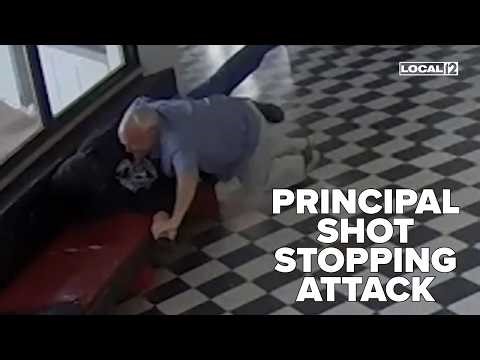 Principal tackles armed former student in high school lobby, injured in shooting