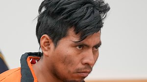 Glaring 'killer' denies torching woman and watching her body burn on NYC subway