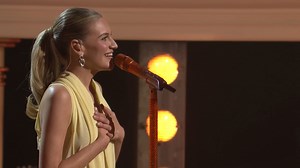 Kelsea Ballerini hits the stage to perform "I Was Country When Country Wasn't Cool" at Opry 100: A Live Celebration. | NBC