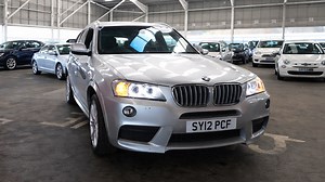 Used car auction includes BMW X3