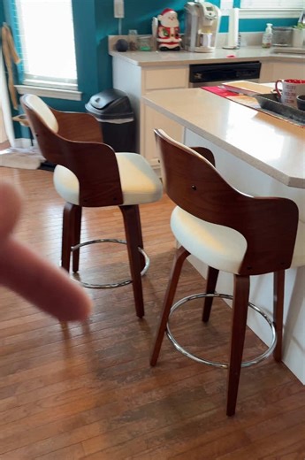 Modern, comfy, and classy - these wooden stools with white leather level up any kitchen instantly. #HomeDecor #FurnitureFinds #KitchenMakeover #TikTokMadeMeBuylt #tiktokshopcreatorpicks