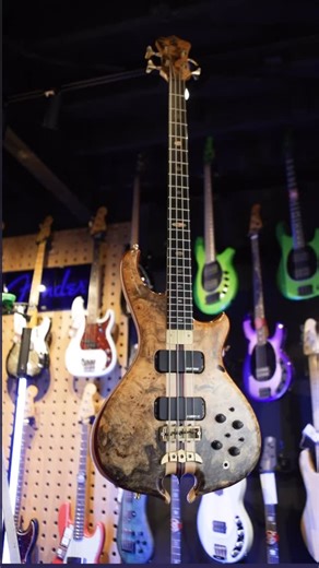 Dream Bass! This Alembic Mark King Signature Bass has just arrived into stock. Buckeye burl top, multi laminated neck, 34" scale, its a work of art. In stock and available @alembicguitars #alembicbass #bassplayer #bassguitar | Bass Centre