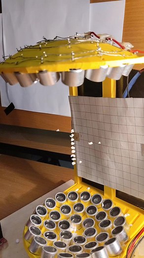 Ultrasonic leviatation. The pieces of foam levitate under the action of standing ultrasonic waves, which create antinodes of ultrasonic pressure. The foam levitates between the nodes of the antinode.