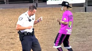 Rodeo Clown Challenges Police Officer To Dance-Off