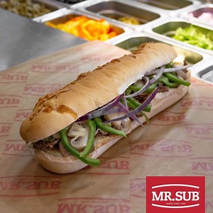 It only takes one bite of our Steak and Cheese Sub to get your mouth craving more. Featuring seasoned steak, cheese and smoky BBQ sauce and your choice of fresh veggies. | MR.SUB