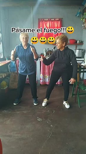 Synchronized Dance Routine in Rustic Kitchen Setting