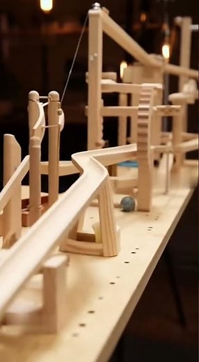 Rube Goldberg style wooden contraption