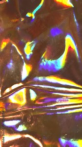 real shiny led light moving over silver rainbow holo foil, glitter awards dust background loop, broken smartphone display signal, 9x16 footage.