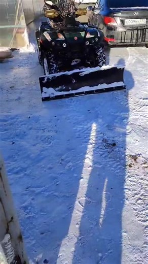 Snow Clearing with an ATV and Plow in Winter Conditions