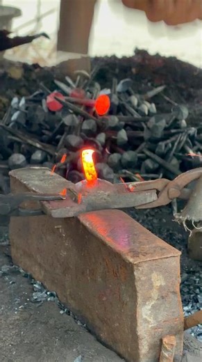 🔨🔥🔥A blacksmith is making nails by heating iron in a fire. #blacksmith #shorts #trending