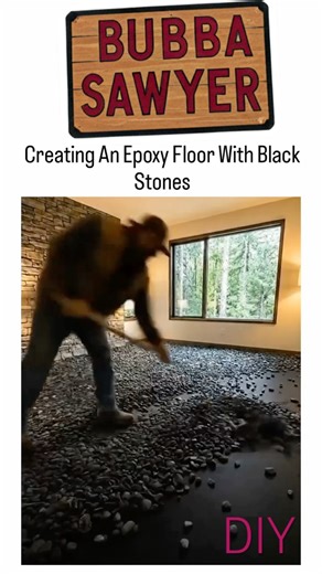 Workers making epoxy gravel floor 2025