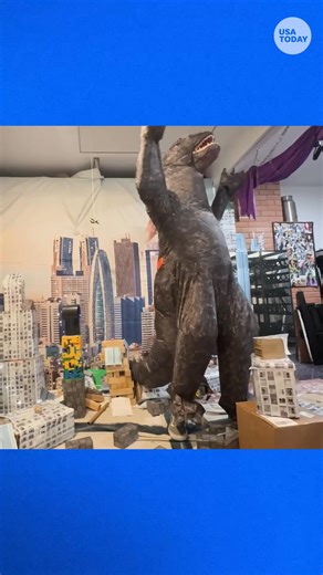 A Godzilla fan's birthday gift was a "rage room," made to relieve stress by destroying a city made of cardboard and Legos, dressed as the radioactive monster. | IndyStar