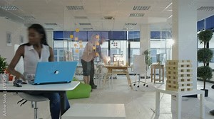 Time lapse creative business team working together in modern office