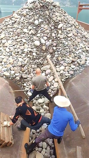 5000 tons of scrap metal hitting the dock like an iron waterfall. ⚙️ No filters. Just pure unloading chaos. #ScrapMetal #MetalRain #PortPower #IndustrialFlow #BargeUnload | Ably Thomas