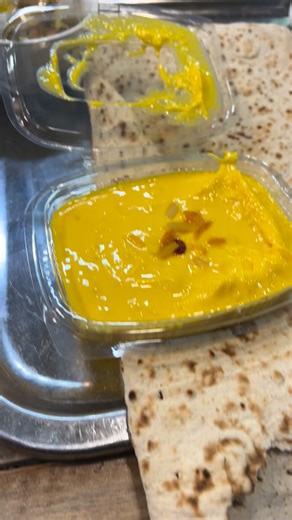 This Iranian dish looks like dessert, but it’s actually made with meat 😳🇮🇷 It’s called Khoresh Mast, a traditional specialty from Isfahan. They slow-cook lamb or beef until it’s super soft, then mix it with yogurt, saffron, sugar, egg yolks, and rosewater. After that, it’s cooked again until thick and creamy, then served cold — sweet, fragrant, and unlike anything you’ve ever tasted. #iran #ısfahan #iranianfood #persianfood #food #foodie #foodiesofinstagram #dessert | Marian On The Move