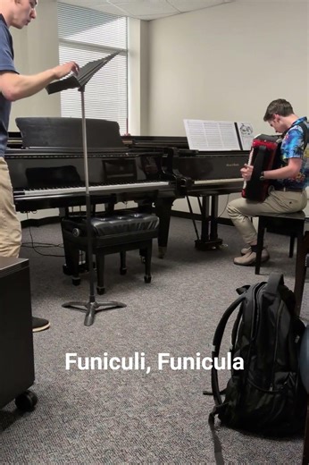 Practicing Funiculi Funicula with an accordion player!