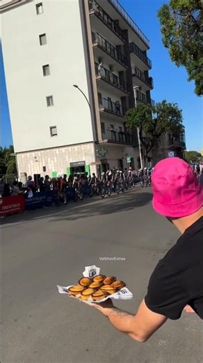 Coach stood at the cycle race with biscuits but only for his students #shortsvideo