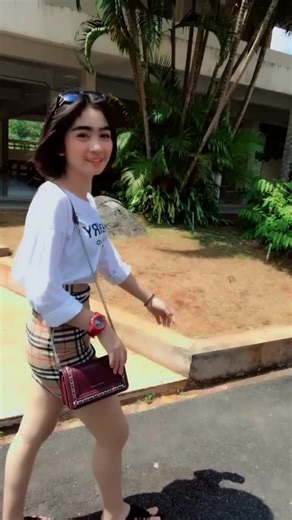 Stylish Outdoor Walk in Plaid Skirt and White Shirt