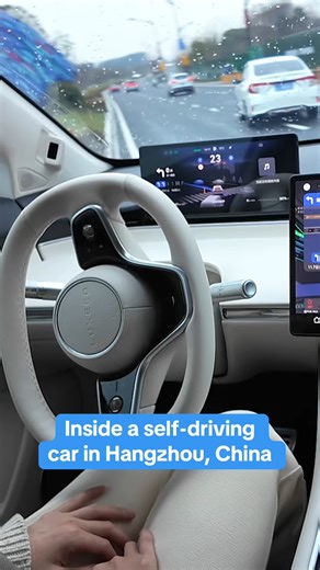 18K views · 125 reactions | CBS News' Anna Coren rode in the backseat of a self-driving car in Hangzhou, China, as it navigated multiple lanes, traffic and highways. These home-grown autonomous vehicles are popular across the country, even as Elon Musk’s Tesla faces regulatory hurdles from the Chinese government in deploying its driverless technology. | CBS News | Facebook