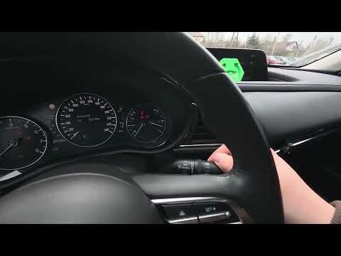 How do I use the front windshield wipers on a Mazda CX-30?