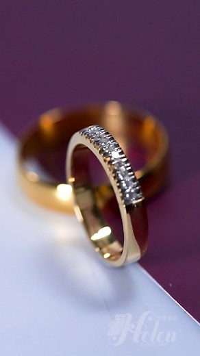 This pair of yellow gold wedding rings is the perfect way to celebrate your love and commitment to each other. The classic solid band and the small stone diamond half eternity band represent the strength and beauty of your relationship. At Helen Jewelry Shop, we believe that every wedding ring should be as special as the couple it represents. That's why we offer a wide selection of rings to choose from, all made with high-quality materials and craftsmanship. Find the perfect rings for your speci
