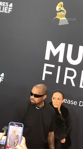 #Ye’s wife Bianca Censori made quite a fashion statement at the 2025 #Grammys. The star and her rapper love stepped out on the red carpet at the event, where she donned a large fur floor length coat – but then she took it off in a shocking moment, revealing she was rocking a nearly nude sheer look that showed off her curves. #AwardSeason | Access