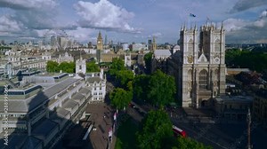 Aerial view of London including Westminster Abbey and Big Ben. Major sights included in this view are Big Ben and Houses of Parliament, the London Eye, Shard, Canary Wharf and the Supreme Court