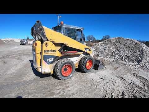 CAT 252B on Galileo Skid Steer Tires: Unstoppable in Mud and Rock