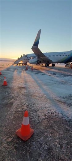 elder love and elder johnson board a plane to #anchorage #vibes