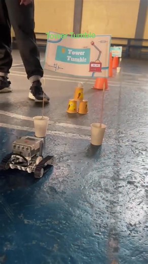 Tower Tumble: An exciting blend of engineering, coding, and teamwork where students put their creativity and critical thinking to the test! As robots attempt to build, balance, and sometimes tumble towering structures, learners experience real-world concepts such as stability, gravity, precision, and problem-solving. Beyond the fun and laughter, this activity fosters collaboration, resilience, and innovation proving that learning becomes more meaningful when students are actively engaged and cha