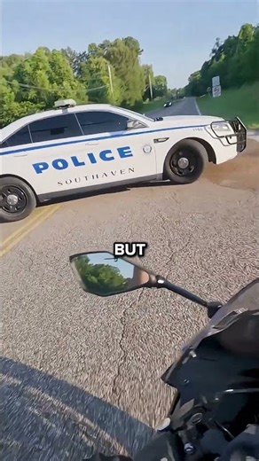 cop illegally makes a U-turn and then runs away