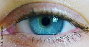 perfect blue eye macro in a sterile environment and perfect vision in resolution 6k, concept, the vision of the future and healthy life concept. view precise and straight to the target.